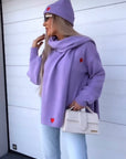 Pull cappellino e sciarpa