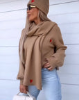 Pull cappellino e sciarpa